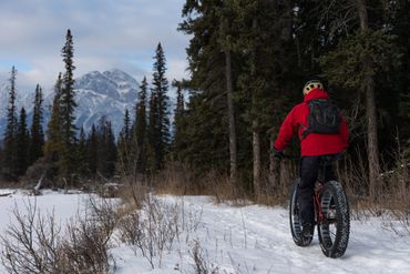 fat biker in snow in jasper alberta fun thing to do in winter activity