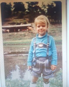 The owner, Shauna Lee in her lederhosen on a Colorado farm.