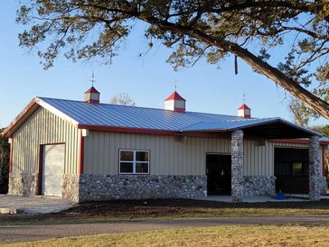 Metal barn with red trim