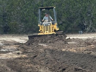 Dozer pushing dirt