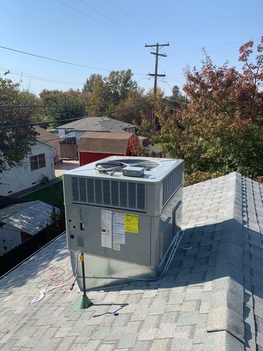 Trane Gas PAK unit down flow with new curb