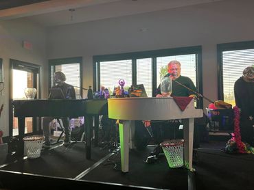 Noel and Dan performing at the 2024 Dueling Pianos fundraiser