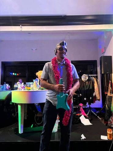 Guest performing at the 2024 Dueling Pianos fundraiser