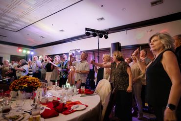 Guests enjoying the 2025 Dueling Pianos fundraiser