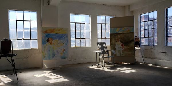 Marcene Glover Art, MG Studio On7, industrial loft artist studio, view of city and mountainside,
