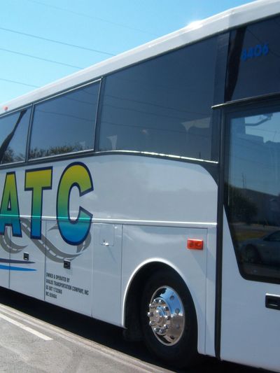 White ATC Bus Charters Company Rentals in Orlando FL for groups on trip, tour or travel.
