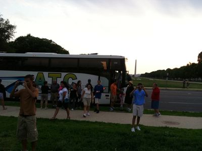 Florida Group on Tour in Washington DC USA on a ATC white Bus and behind the Washington Monument