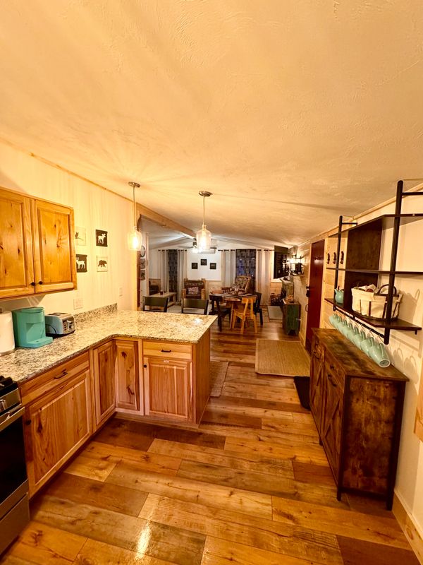 View from Kitchen looking into main living area at Troy's Cabin