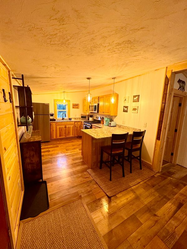 View of the kitchen at Troy's Cabin from the front door.