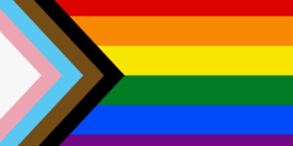 A Progress Pride flag with inclusive colors and chevron design.