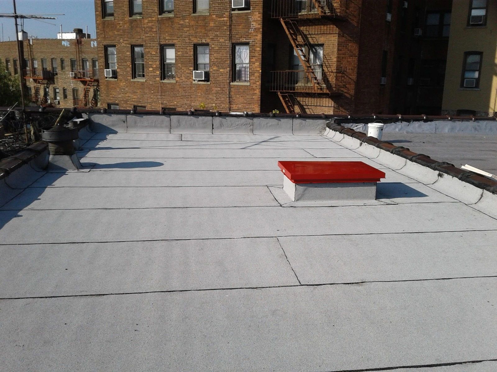 This is the after picture of the new flat roof that was intalled in Brighton Beach Brooklyn roofer