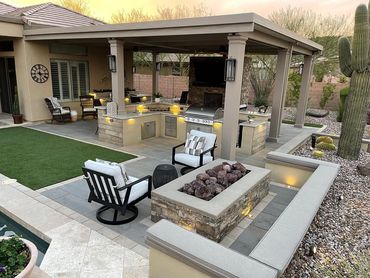 OUTDOOR COVERED KITCHEN/LIVING ROOM WITH FIREPLACE/FIREPIT AND BAR AREA