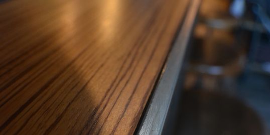 Custom metal and wood inlay countertop