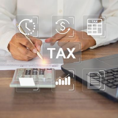 Tax payment and Calculation tax return concept. Businessman using a tax form to complete