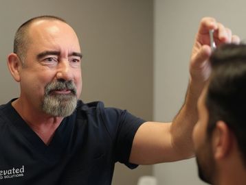Doctor performing neurological testing for a personal injury patient