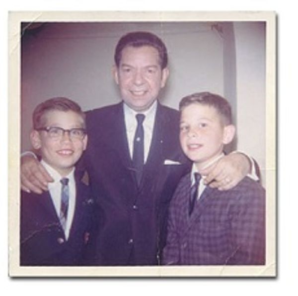 Old portrait of three people wearing formal clothes