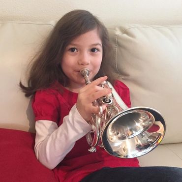 You are never too young to play a CarolBrass pocket trumpet