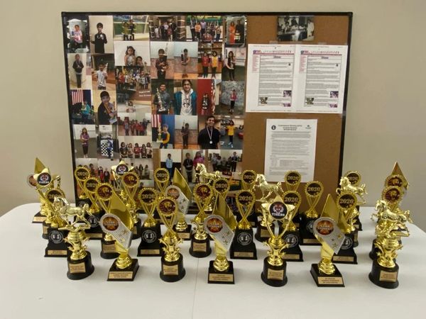 [image of trophies won at the tournament]