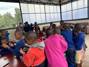 Moments of creativity and play with children at COKO in Tanzania.