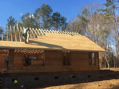 LOG HOME ROOF SYSTEM