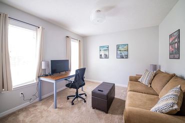 Downstairs Office/bedroom with pull out couch- does have french doors for privacy
