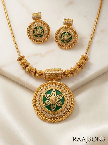 Intricate gold necklace and matching earrings set on green, for the uniqueness just like you.