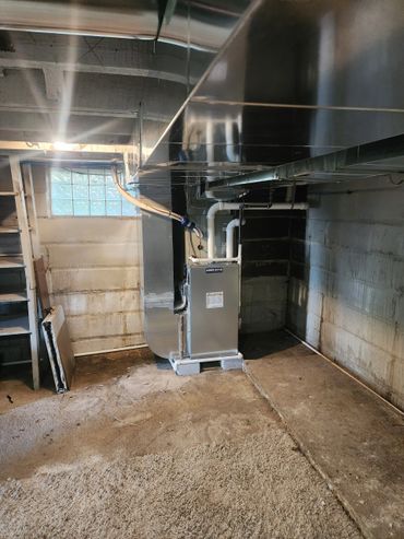 Fresh change out of a furnace in a basement