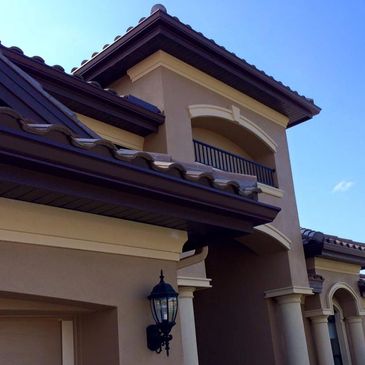 6" Seamless Gutter Installation in Musket brown with painted downspouts.