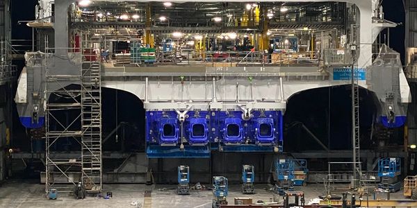 Ferry named Bajamar Express under construction in a shipyard.