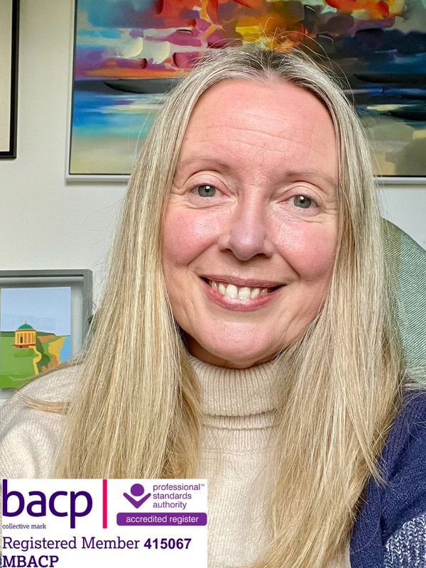 Gillian Burke smiling with BACP membership registration number 415067 displayed