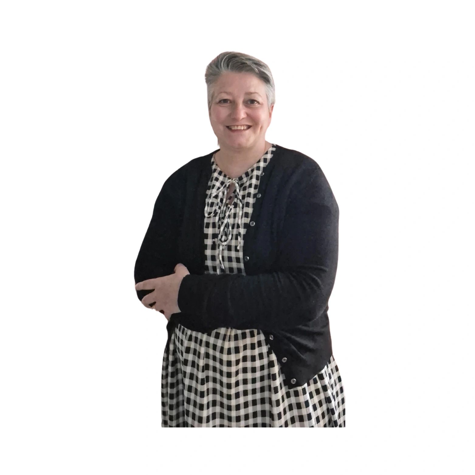 Rachel Beck the owner of The Beck Office standing with arms folded.