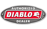Metal badge stating 'Authorized Diablo Dealer' with a devil logo.