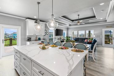 Kitchen stocked with dishes/utensils, pots/pans, coffee maker/Keurig Duo