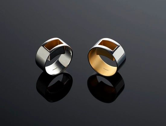 Two sterling silver rings.