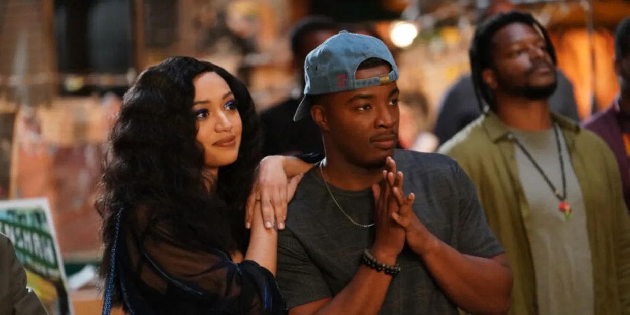 Young couple watching a performance as a date