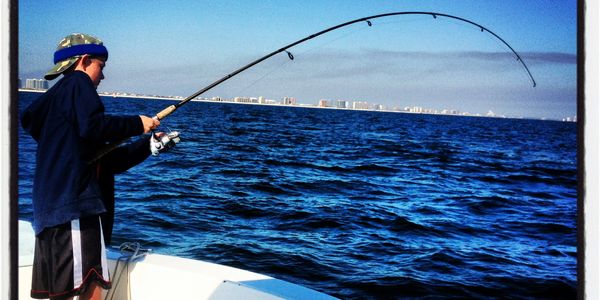 light tackle fishing for big redfish off the coast of Orange beach Alabama. Inshore fishing charter 