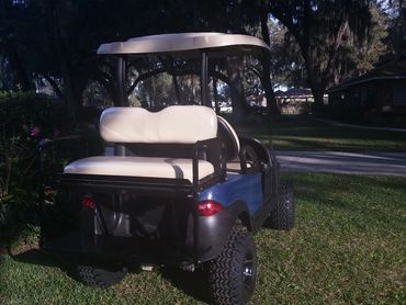 Blue and white golf cart seat