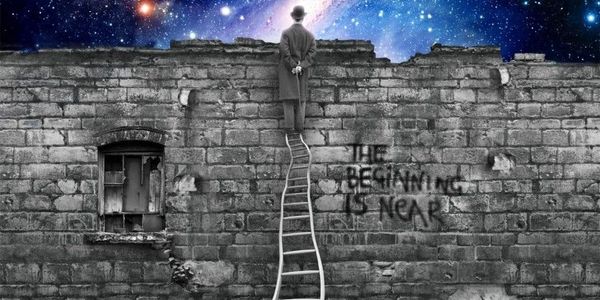 A man looking at the universe while standing on a ladder
