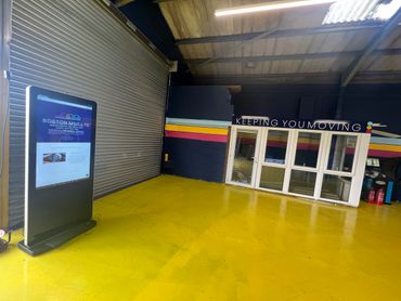 Android Stand alone digital advertising display in the workshop