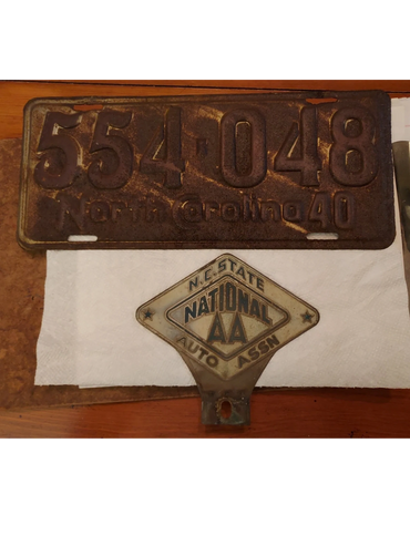 Super rare N.C. State National AA Auto Association tag topper. Great shape. I will leave the cleanin