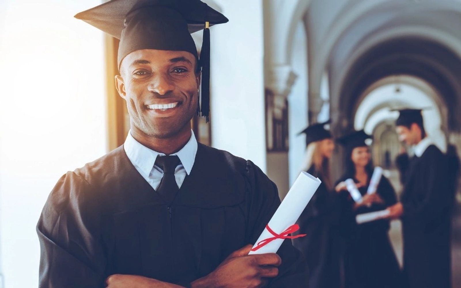 Black scholar with diploma