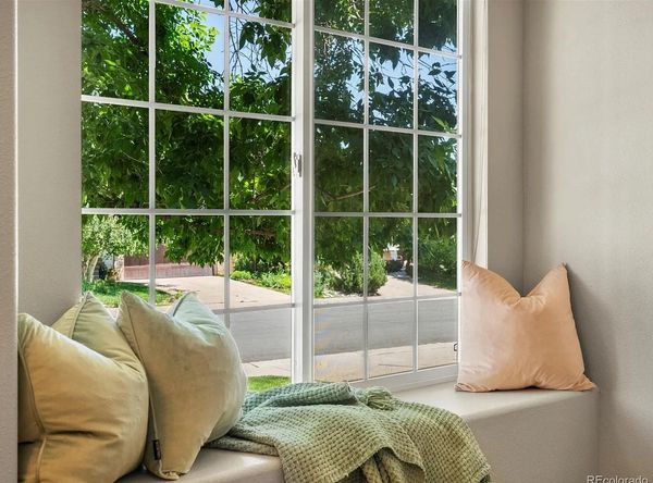 Dress a window seat wit pillows