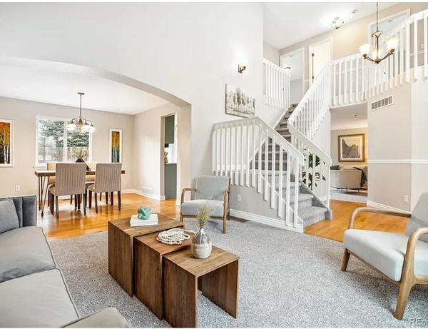 Living room and dining room with high end furnishings