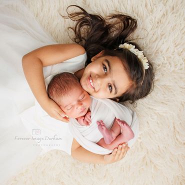 Newborn with siblings