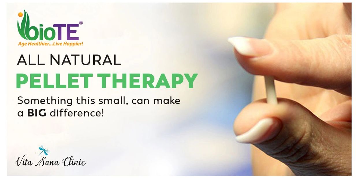 Promoting all-natural pellet therapy for health improvement with a small pellet held between fingers.