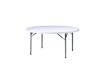 A round white folding table with metal legs.
