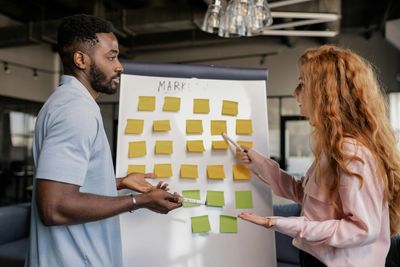 Colleagues discussing marketing plan