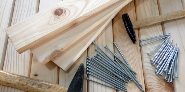 2x4 lumber, hammer and nails