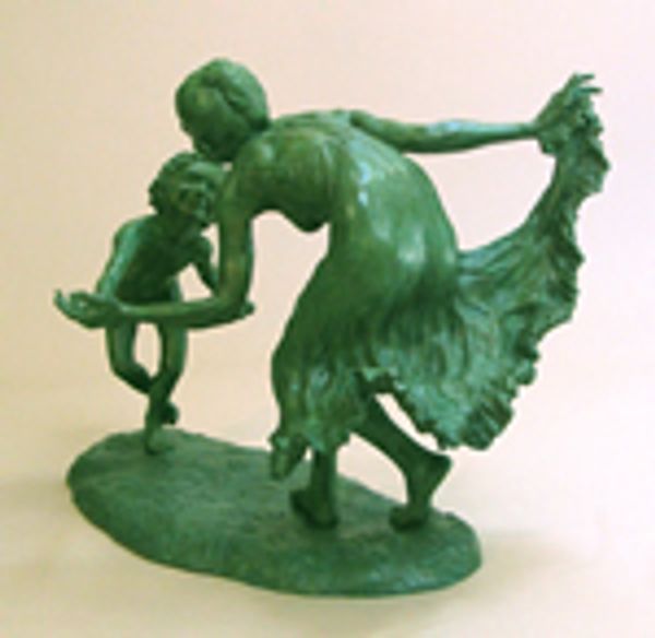 Artwork of a statue in green color of a woman and a child