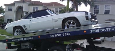 Flat bed towing service in west palm beach